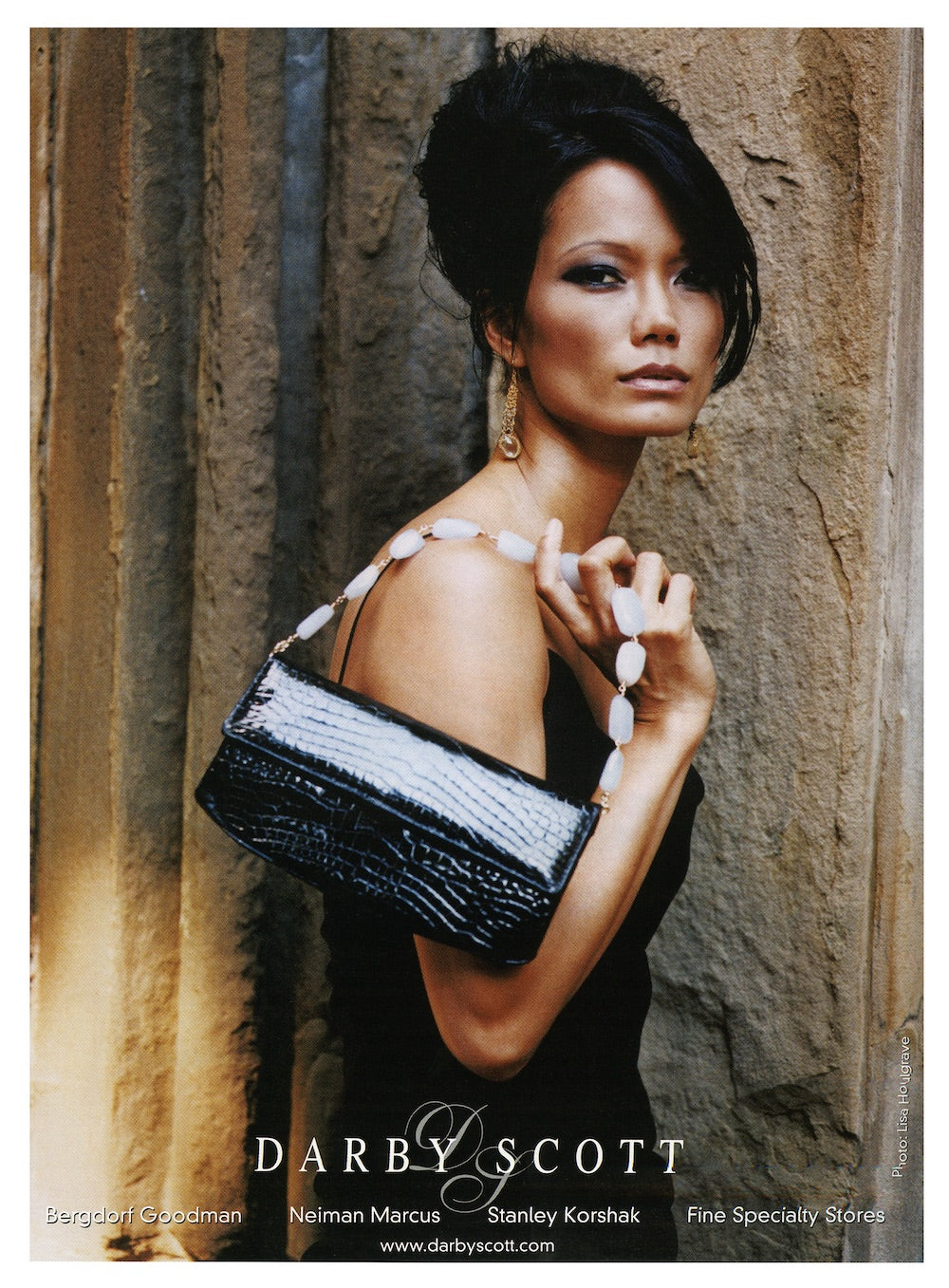 Model carrying a Darby Scott Handbag with Jeweled Handle