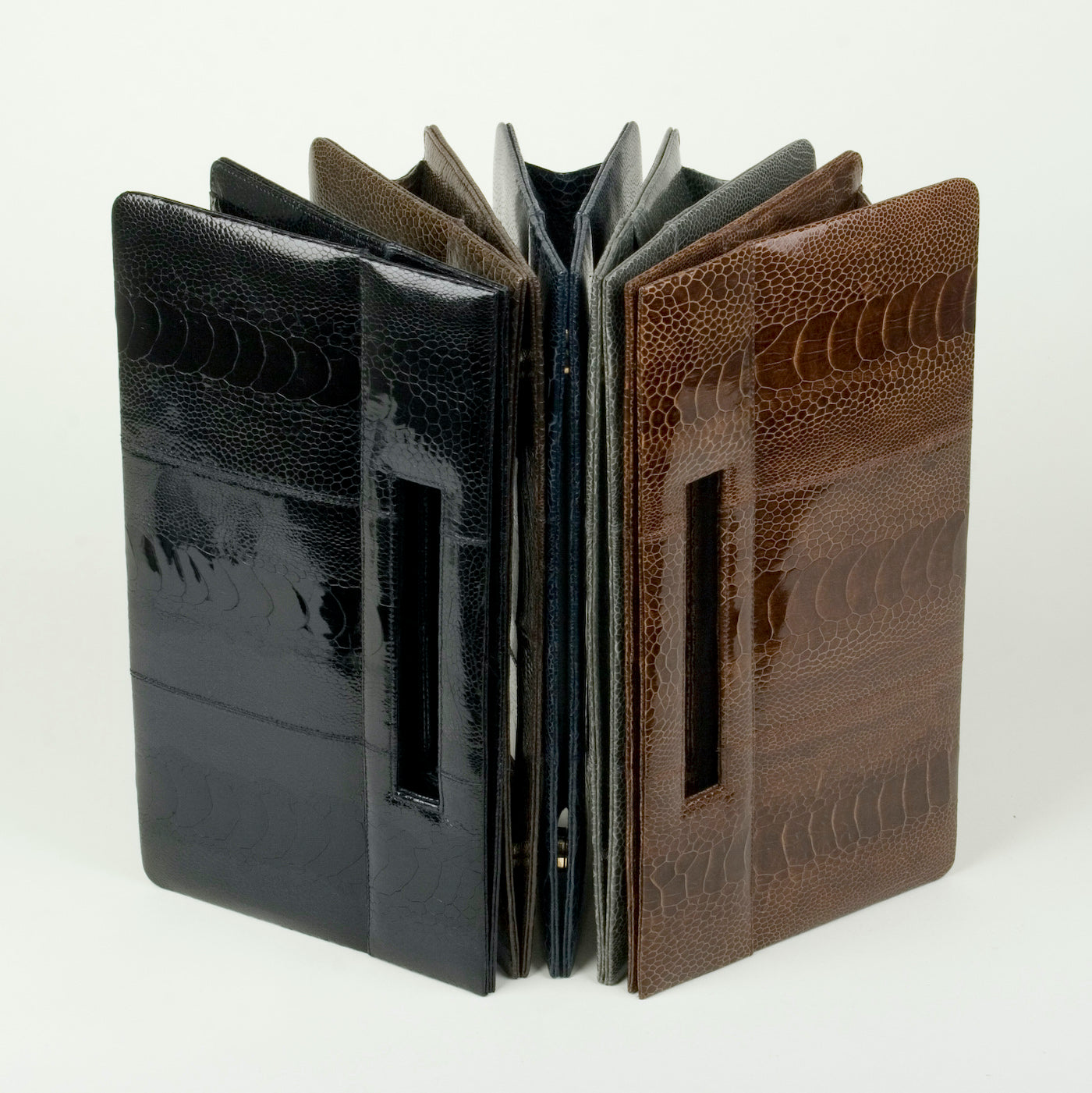 Ostrich leg clutches with cutout handles - Darby Scott
