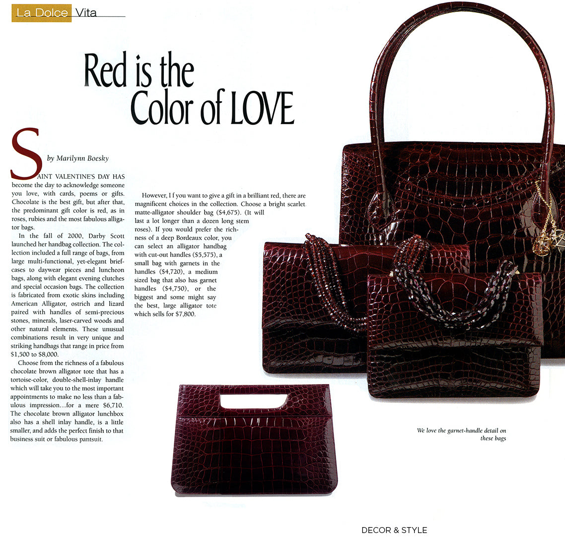A collection of Red Alligator Handbags by Darby Scott alongside an article by Marilynn Boesky