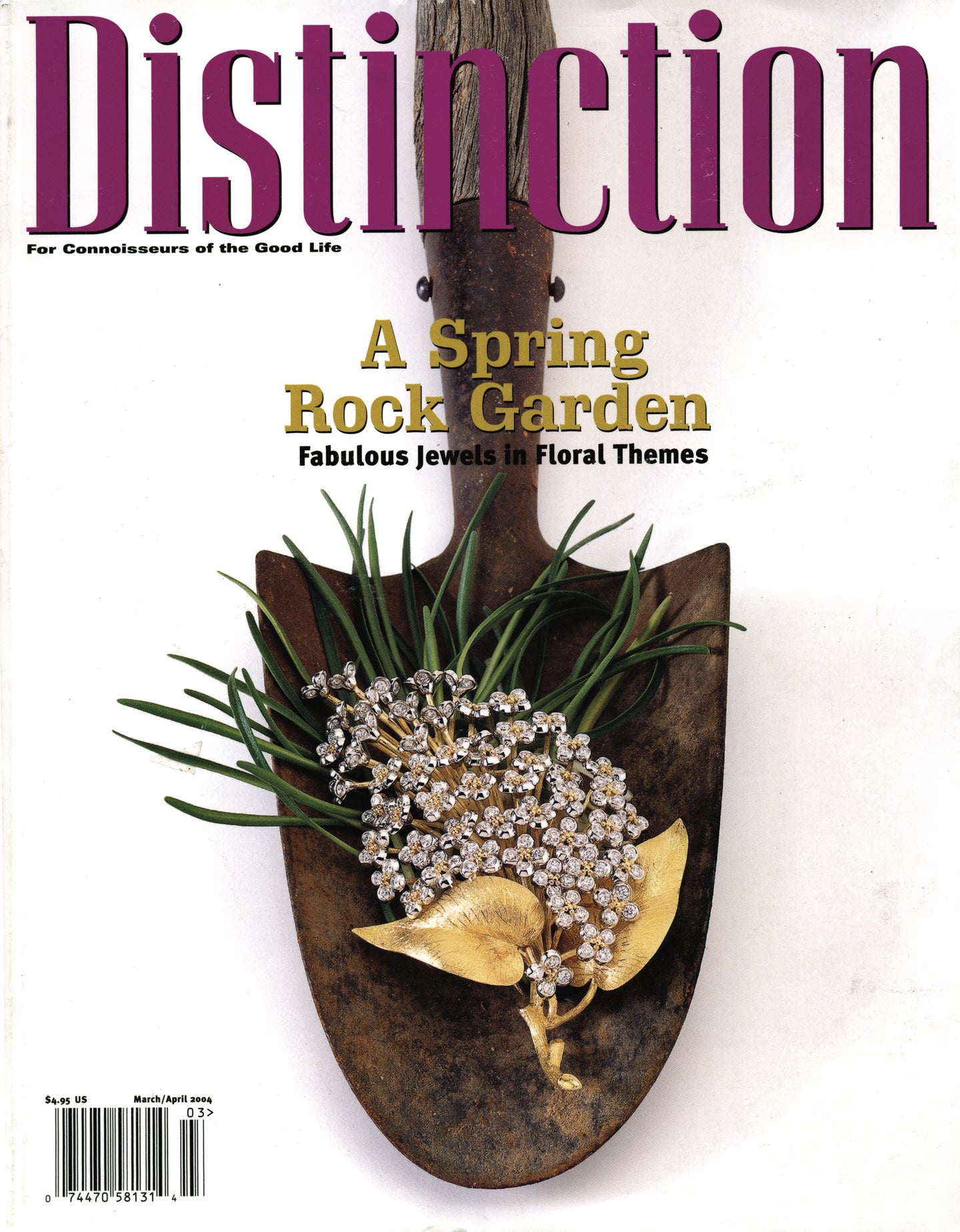 'Distinction' Magazine cover featuring a spring rock garden theme with jewelry on a shield.