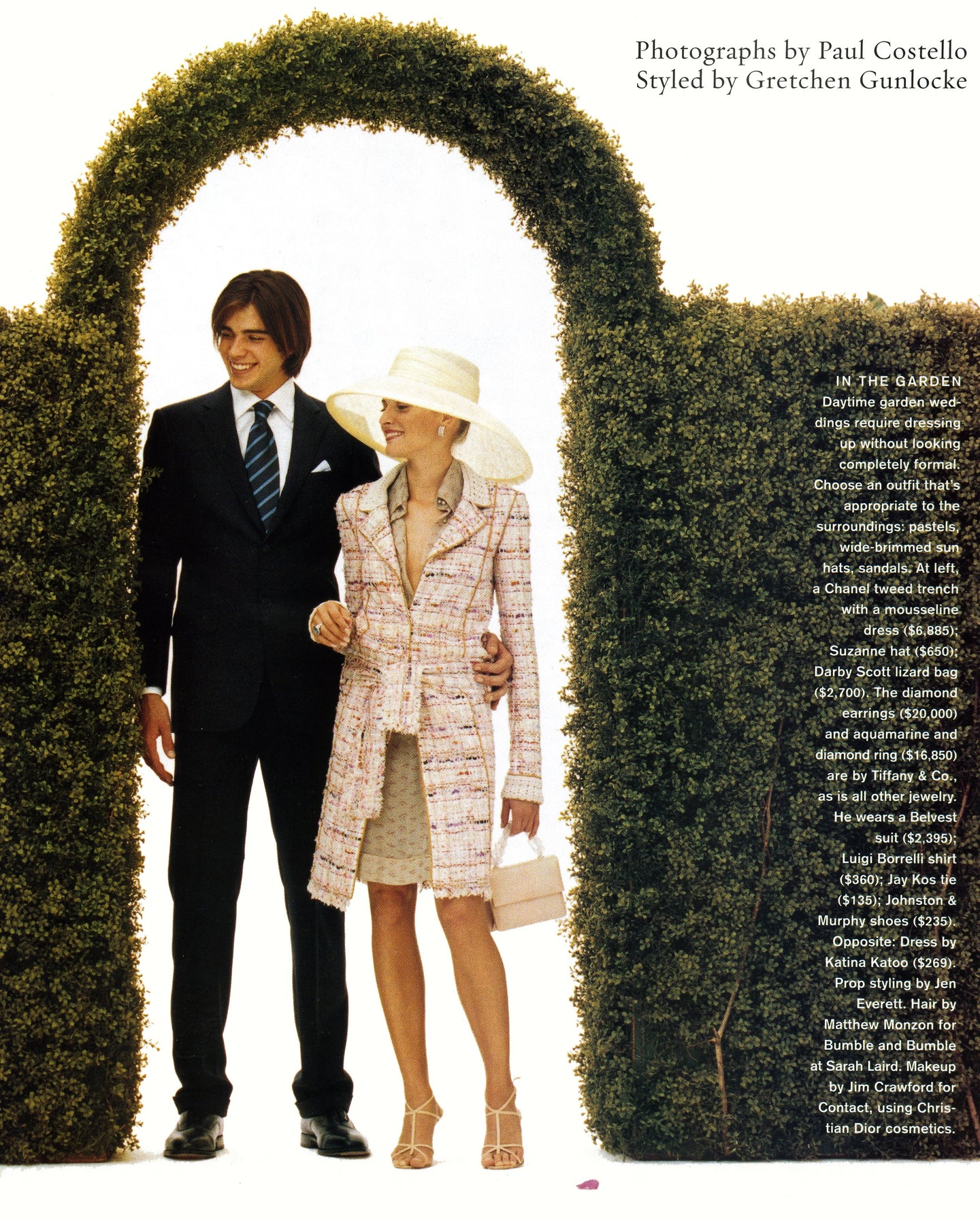 Models standing in a garden in formal attire