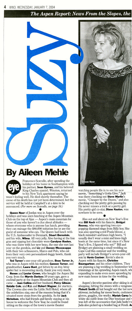 Newspaper article with a portrait of Queen Noor and the word 'SUZY' in large blue letters.