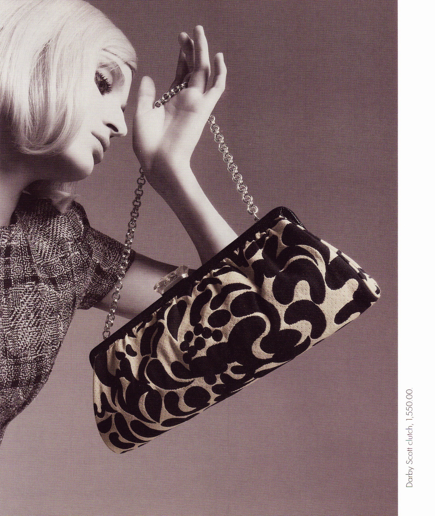 Model with Black & White Brocade Long Clutch by Darby Scott