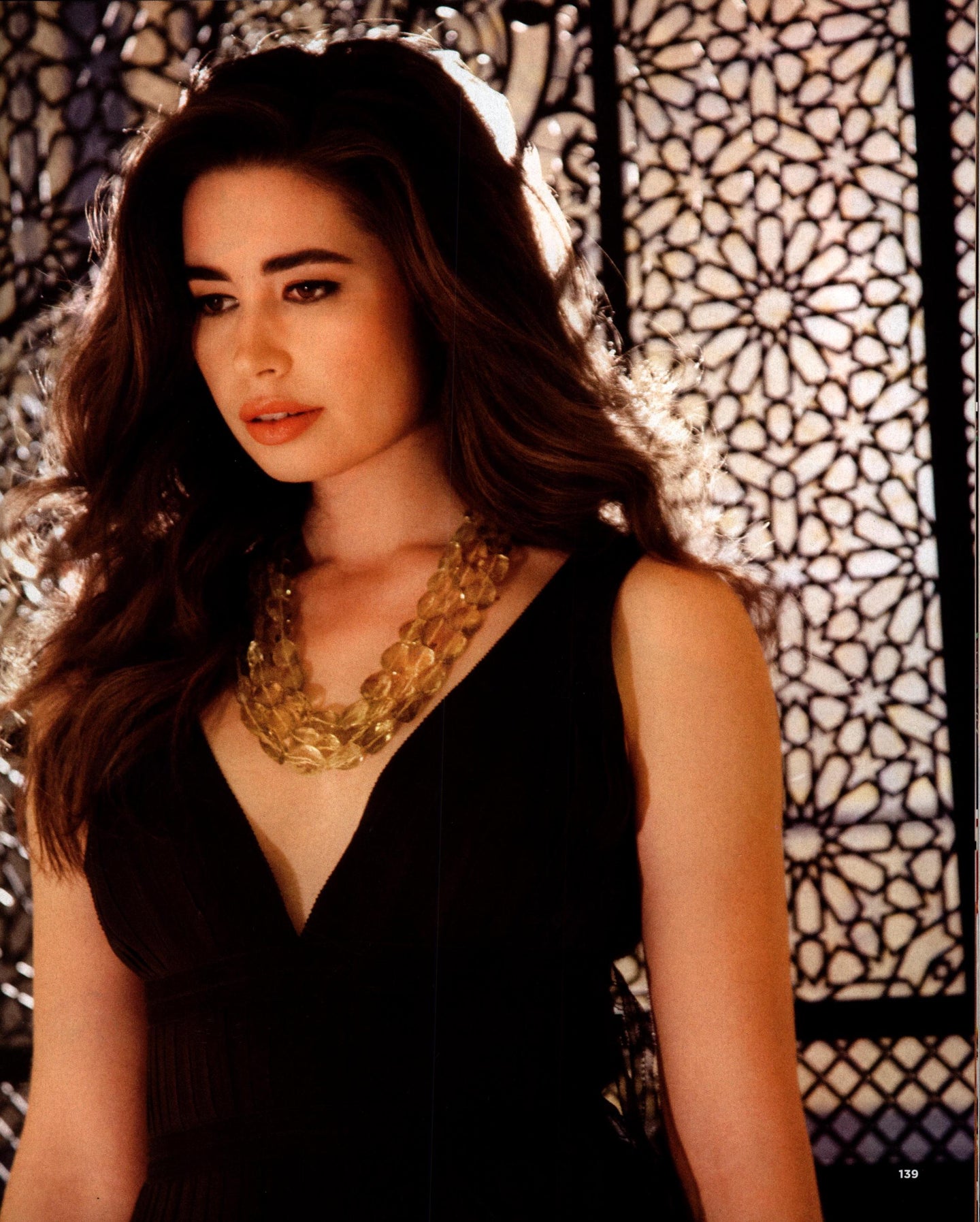 Model wearing a three strand Citrine Necklace by Darby Scott