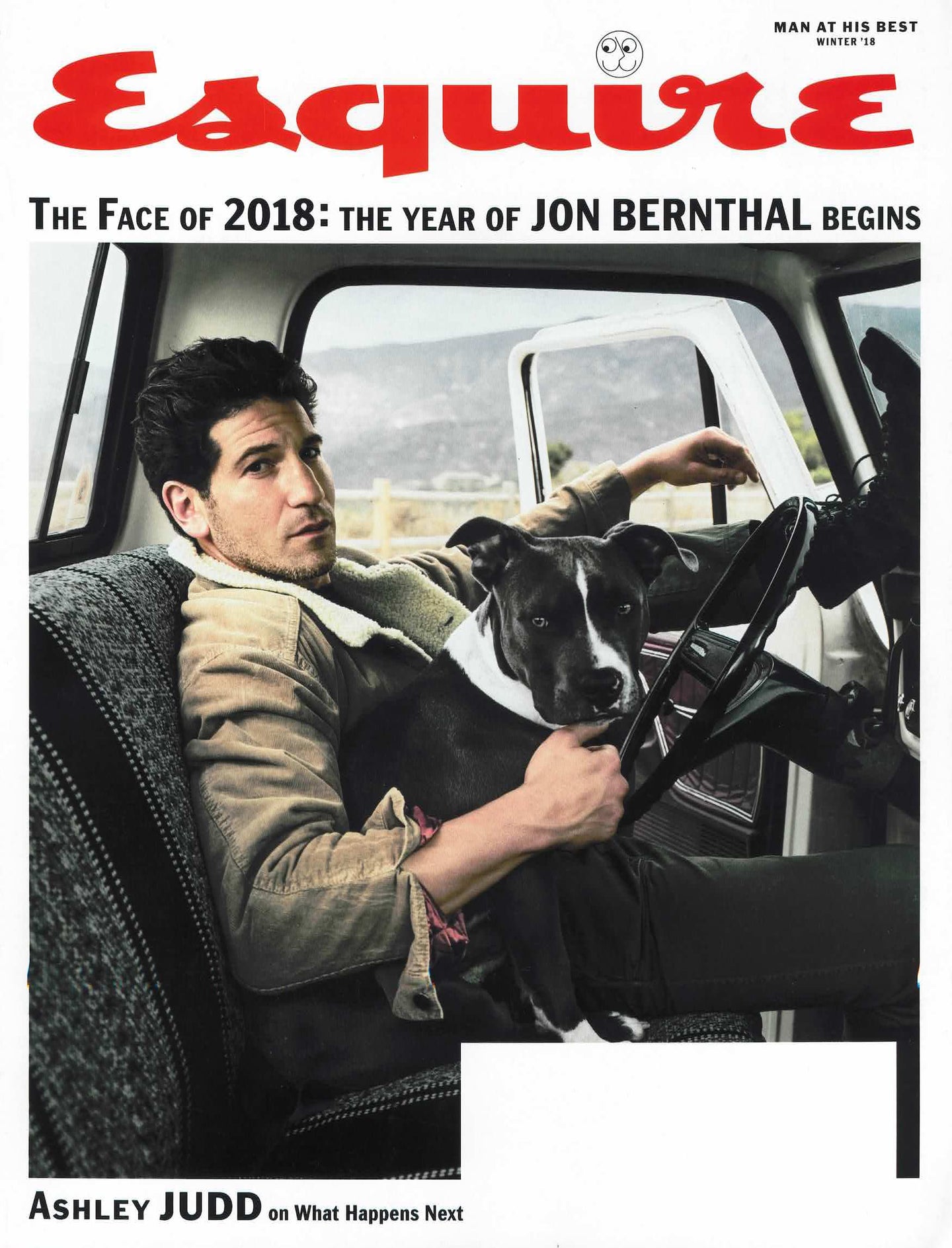 Esquire magazine cover with a man sitting in a car holding a dog, featuring Jon Bernthal.