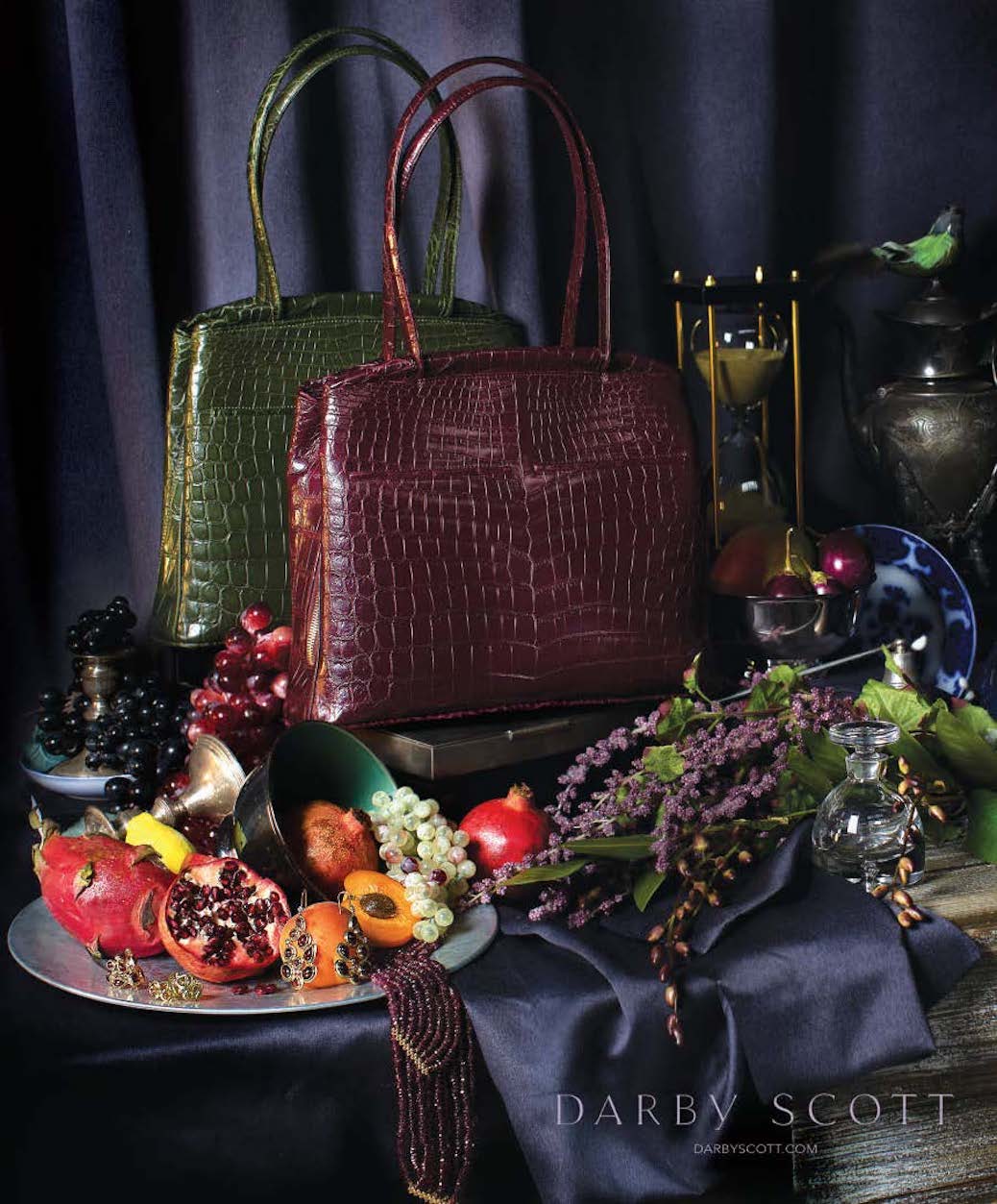 Darby Scott's Crawford Totes in Niloticus Croc and Garnet Jewelry in a setting based on