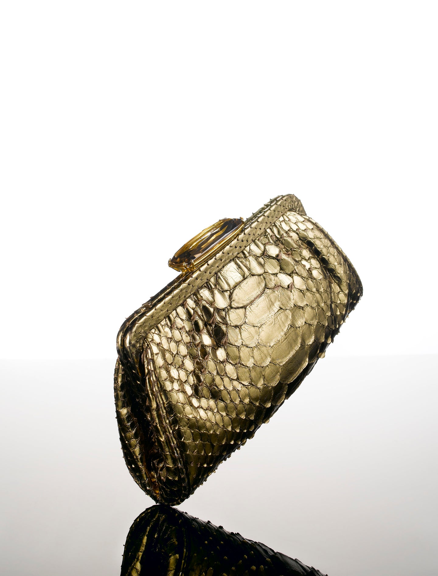 Gold metallic python clutch with smokey topaz top-lock by Darby Scott