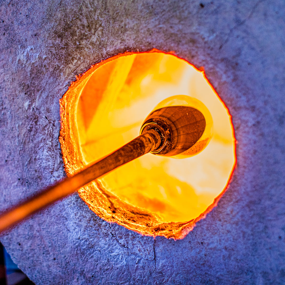 Heating glass for blowing