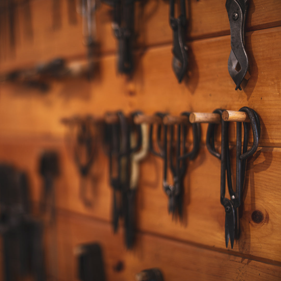 glass making tools on wall