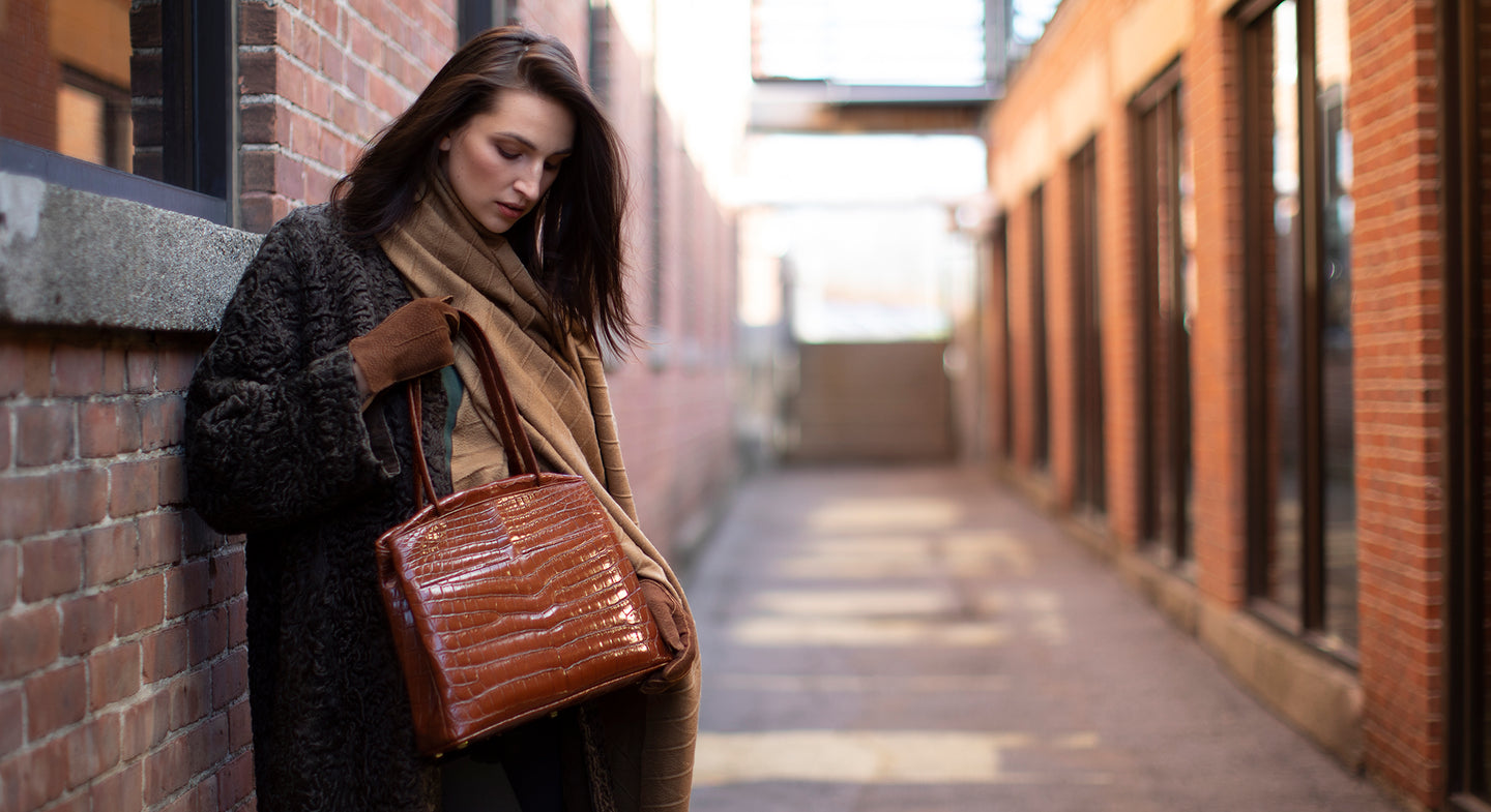 Cognac Crocodile Handbag held by model