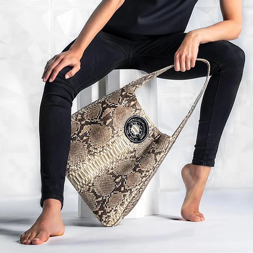 Model with a Natural Python Paige Hobo Bag