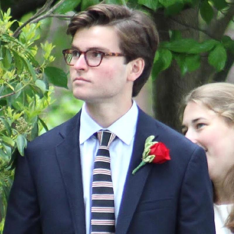 Model in suit with rose