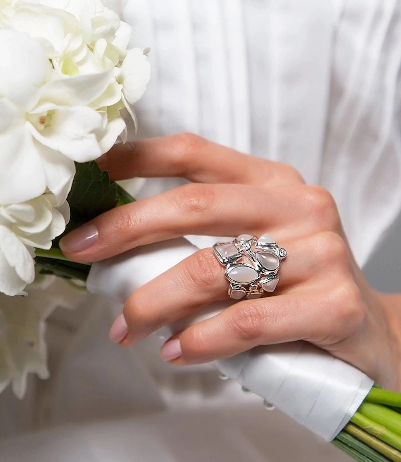 Moonstone & Diamond Mosaic Ring on woman holding bouquet of flowers - Darby Scott