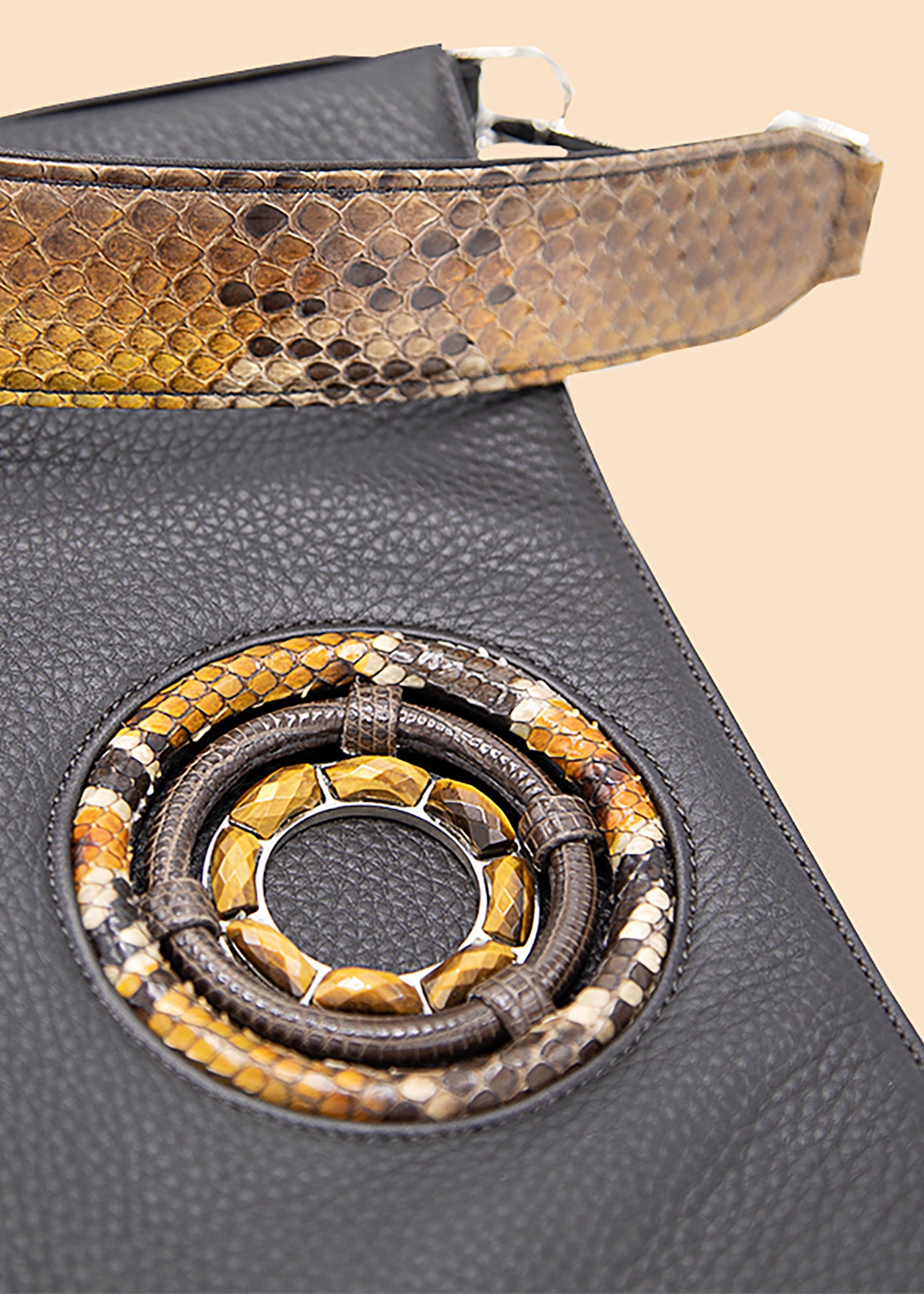 Close up of Grommet with tiger-eye gemstones - Darby Scott