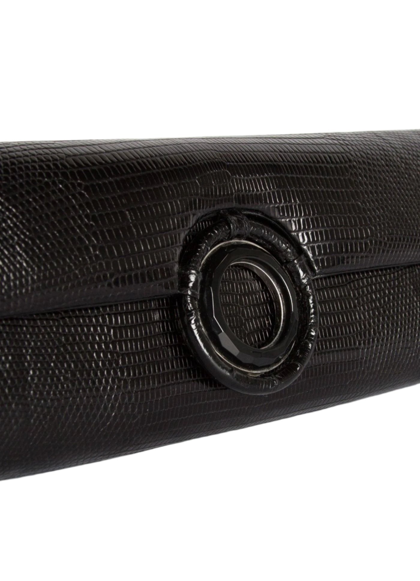 Detail view of Black Onyx Grommet on black lizard clutch - Darby Scott