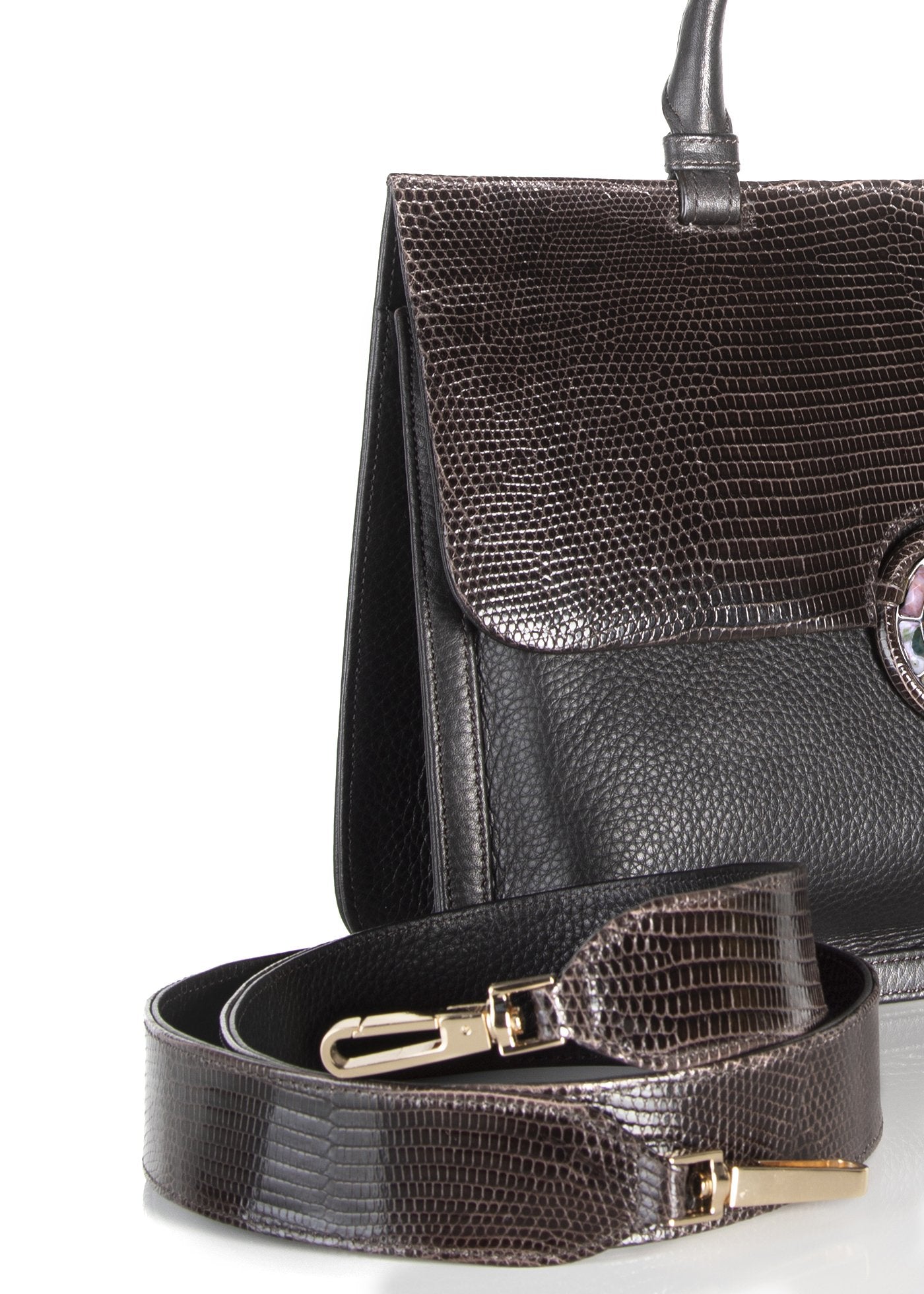 Detail view of lizard strap and saddle bag - Darby Scott