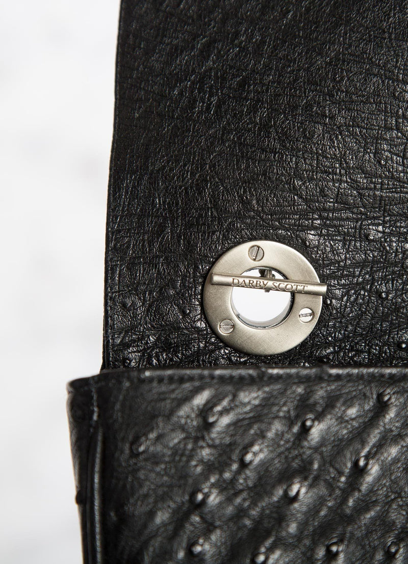 Interior view of handle toggle on Black Ostrich Shoulder Bag - Darby Scott 