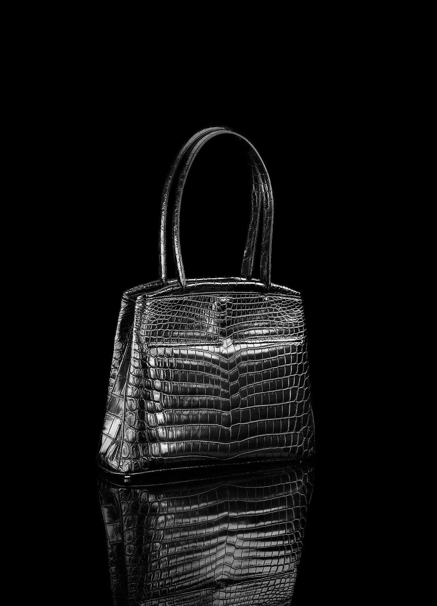 Angled view of Black Niloticus Crocodile Crawford Tote - Darby Scott