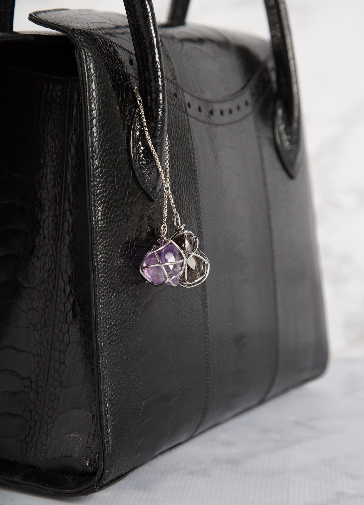 Detail of Amethyst & Smokey Topaz Fob on Black Tote- Darby Scott