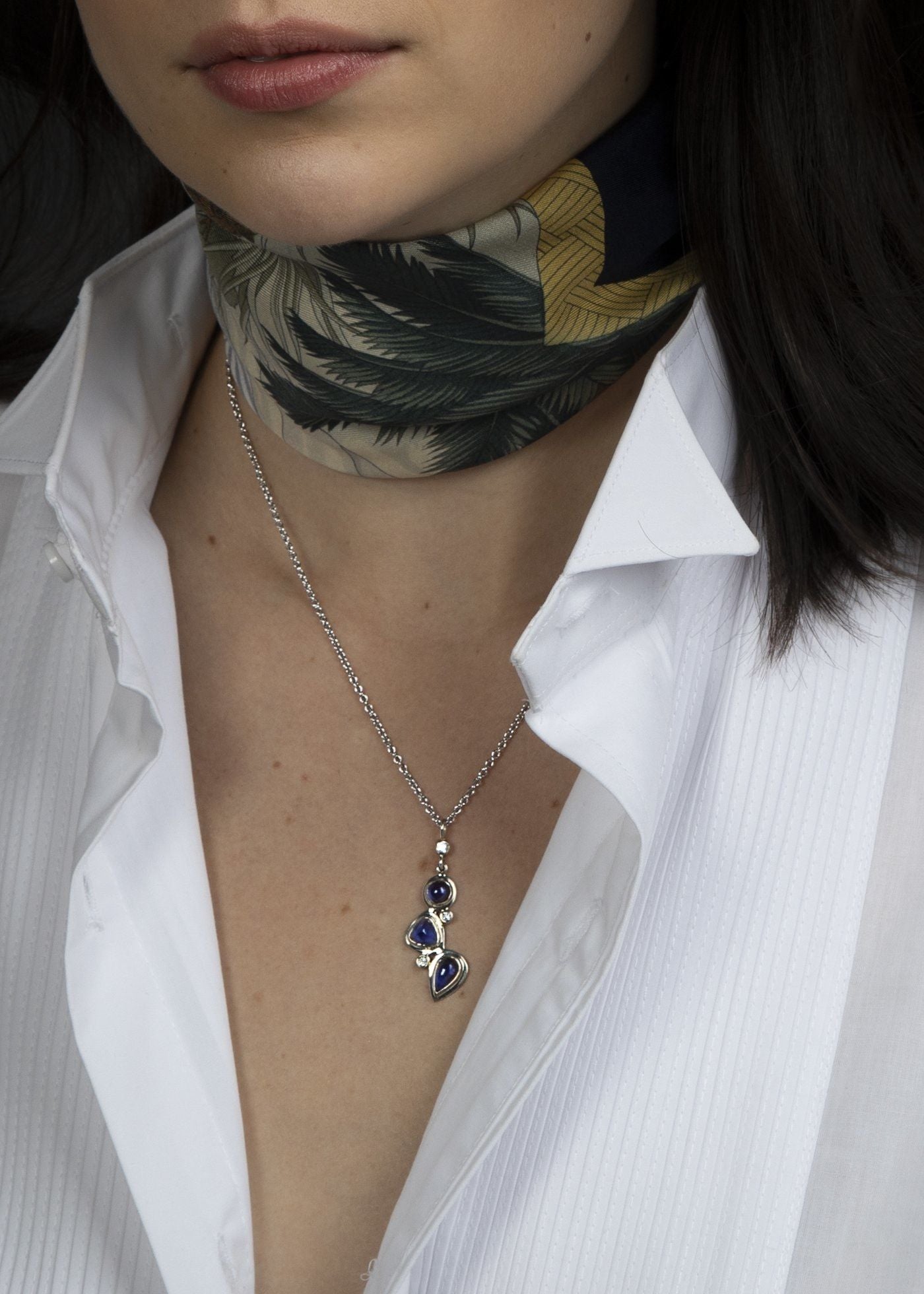 Iolite diamond sterling necklace mosaic 3 stone on model - Darby Scott