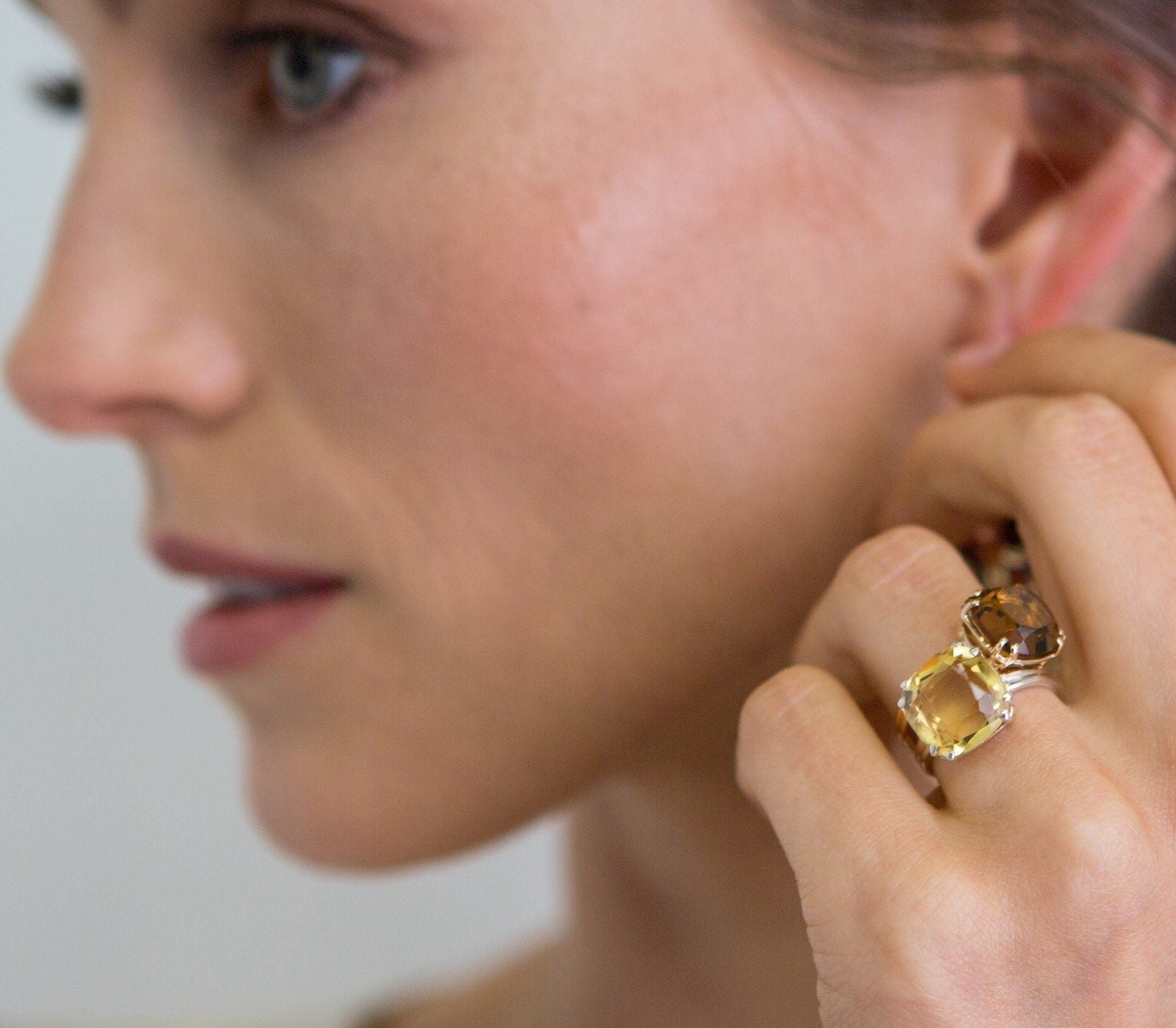 Model wears Imperial Topaz & Citrine 12mm Cushion Cut Sterling Rings - Darby Scott