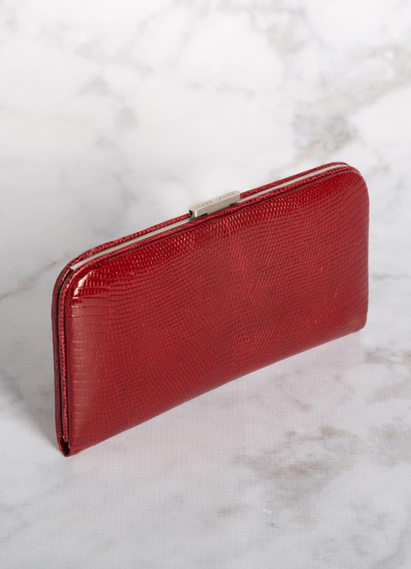 Angled view of Red Lizard Slide Lock Wallet - Darby Scott