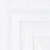 Detail view of hand-stitching edge on cocktail napkins