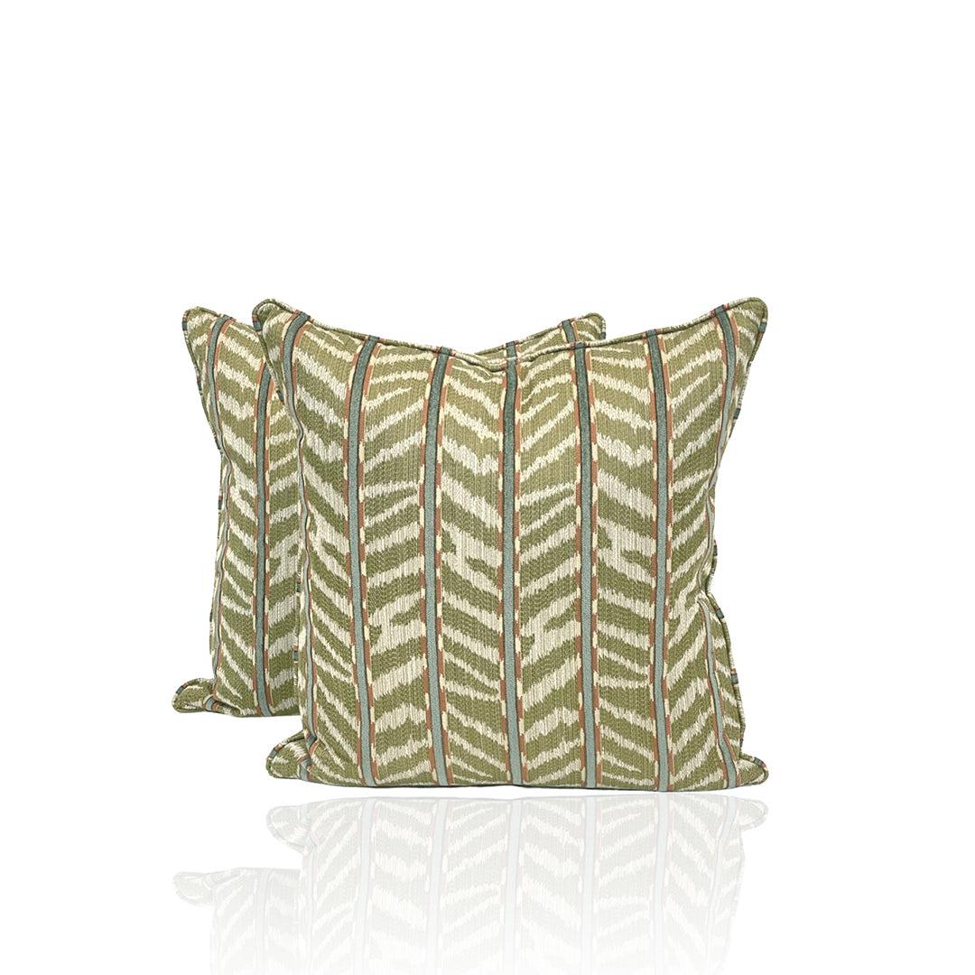 Pair of throw pillows in olive and white chevron pattern