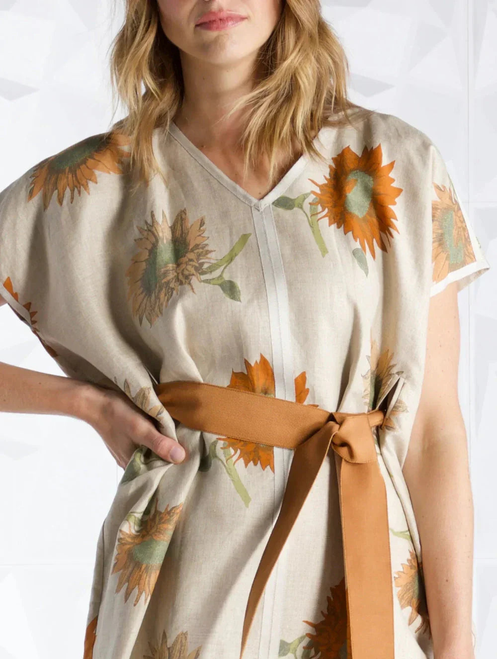 Model in Sunflower Print Dress with Orange Ribbon Belt - Darby Scott