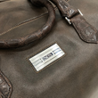 Sterling Silver Monogram Plate on Leather Bag by Darby Scott
