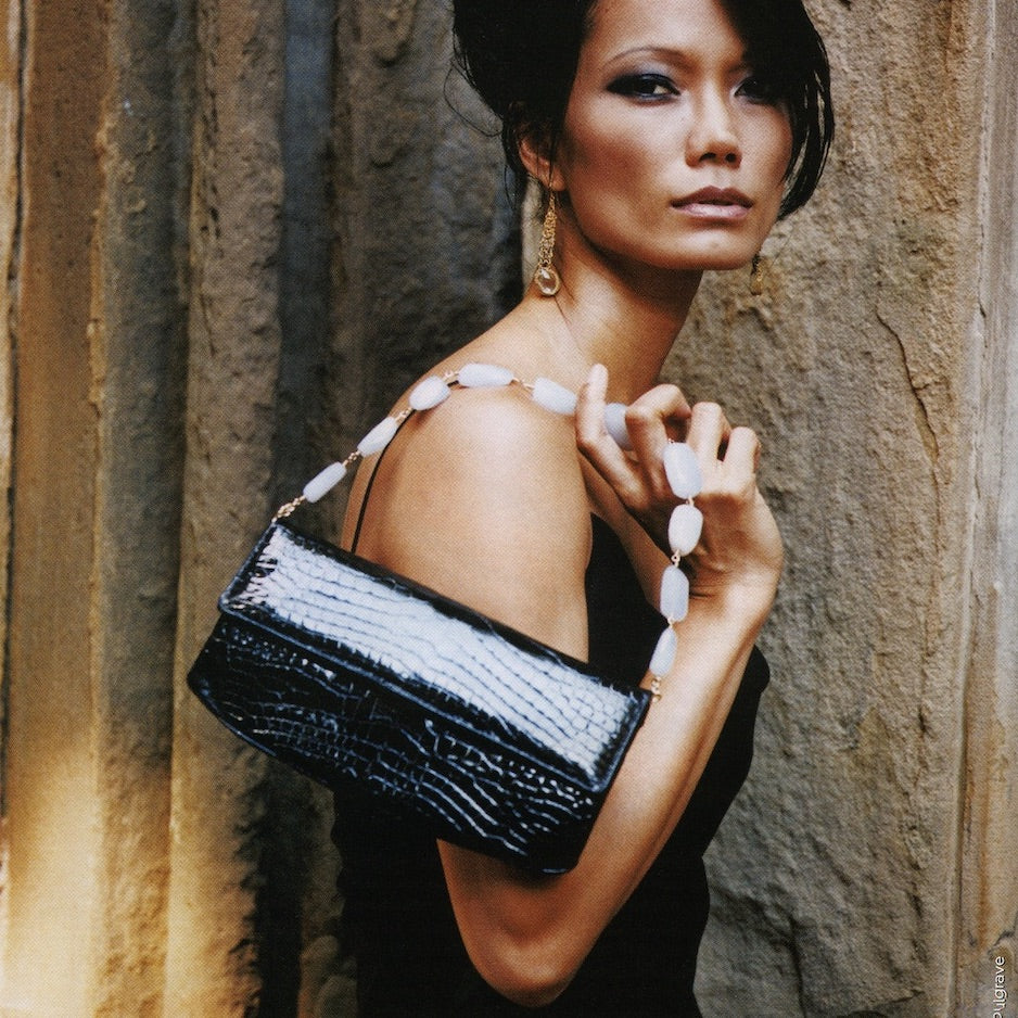 Black Alligator Handbag with Quartz Handle carried by model - Darby Scott