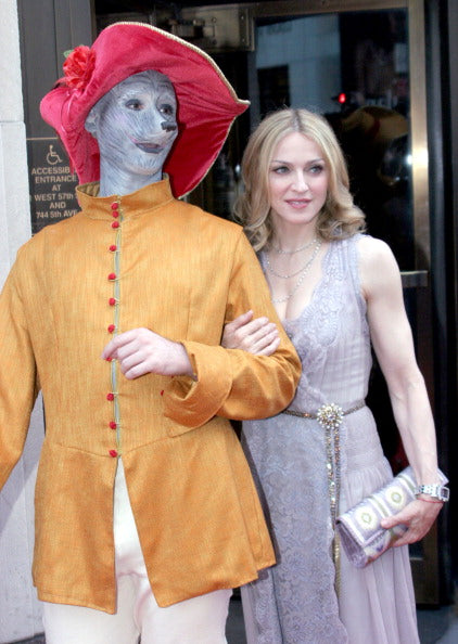 Madonna at her book release carrying a Darby Scott clutch