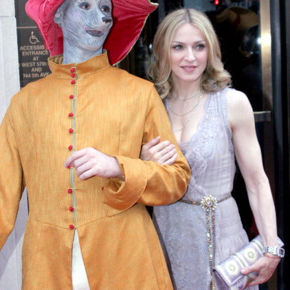 Madonna at her book release carrying a Darby Scott clutch