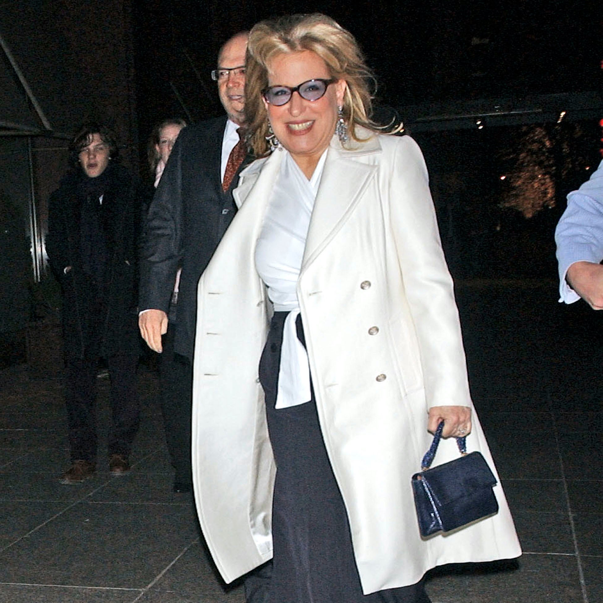 Bette Midler arriving a Jann Wenner's 60th Birthday Party carrying a Darby Scott Iconic Handbag
