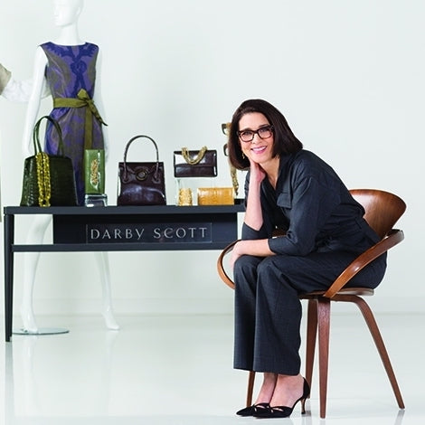 Portrait of Darby Scott in her design studio