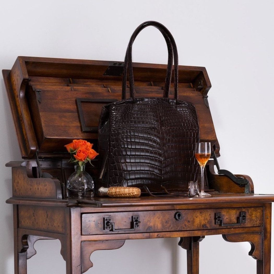 Brown Croc Crawford Tote on an antique desk with flowers and wine - Darby Scott 