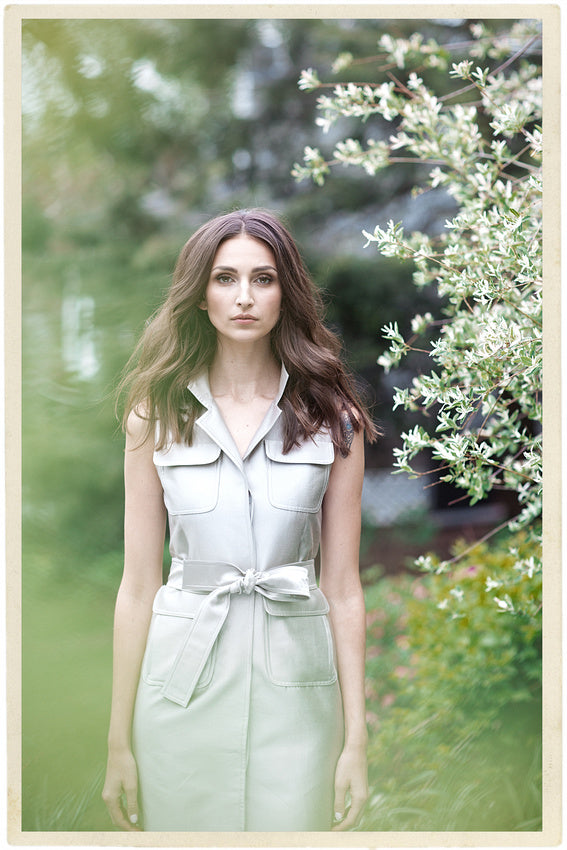 Model in a Darby Scott Safari dress in garden setting