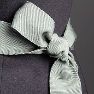 Sage green wide ribbon belt tied in half bow - Darby Scott