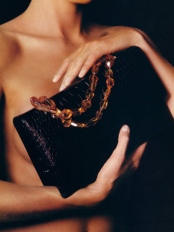 Iconic Handbag by Darby Scott held by model