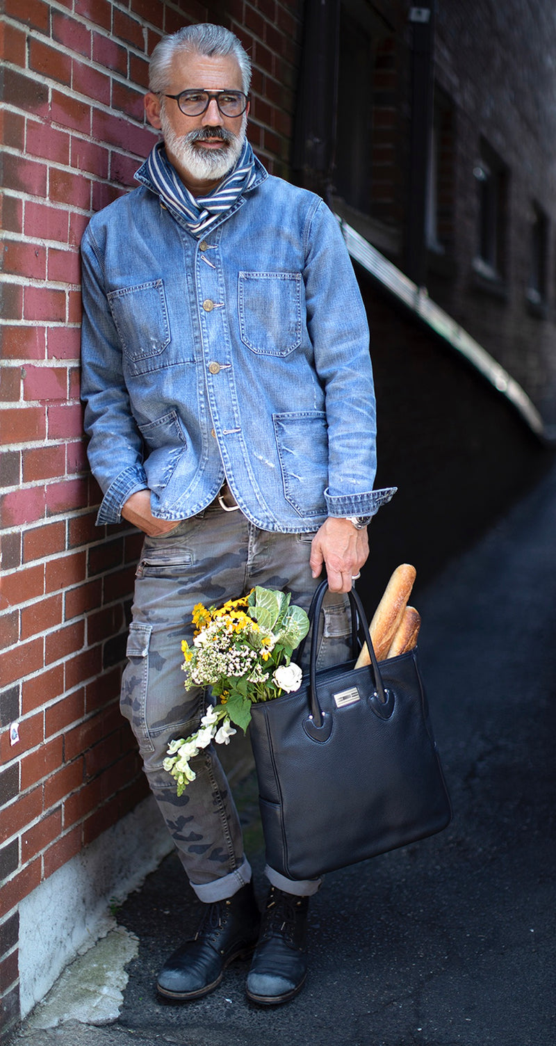 Essex Tote filled with flowers and bread held by Man 