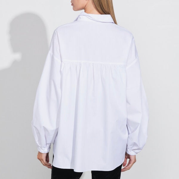 Long sleeve white blouse on model, back view - Darby Scott