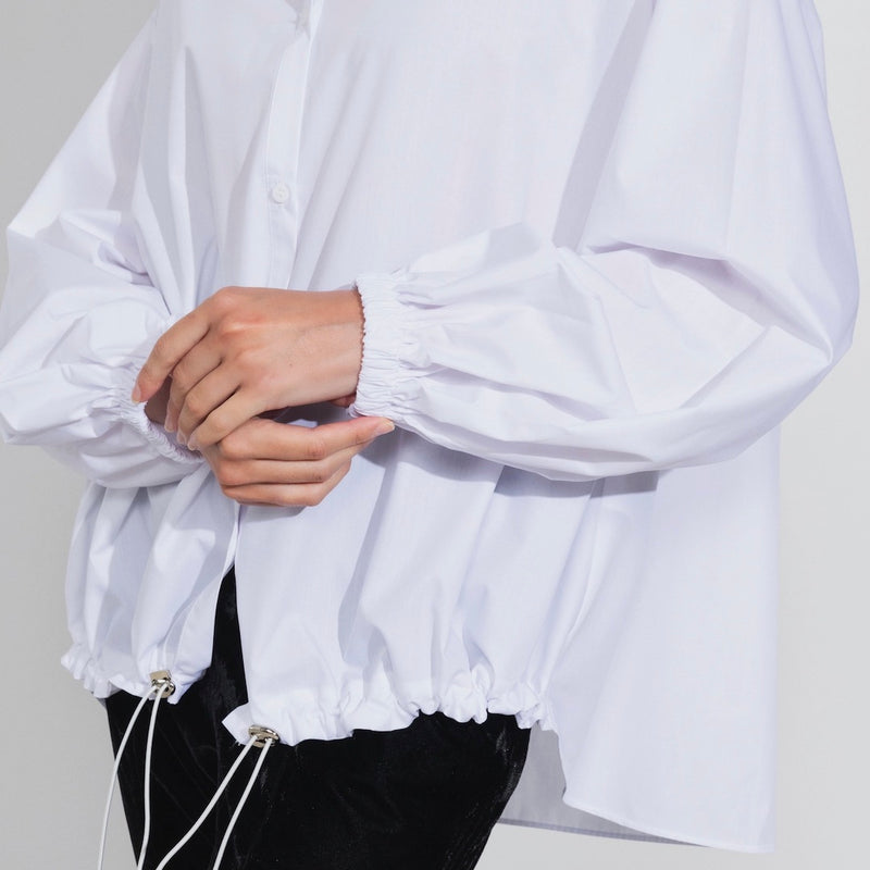Long sleeve white blouse on model detail cuff and tie front - Darby Scott