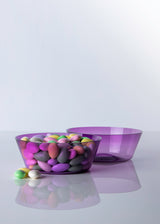 Pair of hand blown amethyst glass candy bowls, with pastel candy
