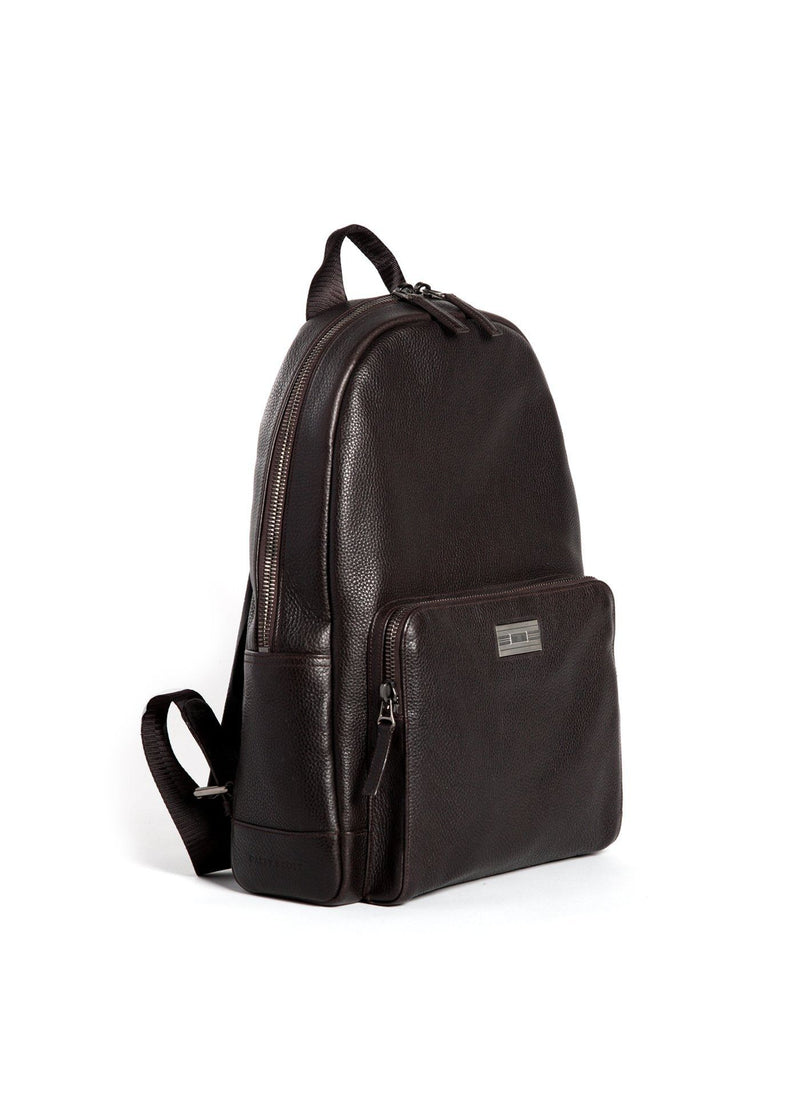 Angled View of Brown Leather Monogram Stuart Backpack - Darby Scott