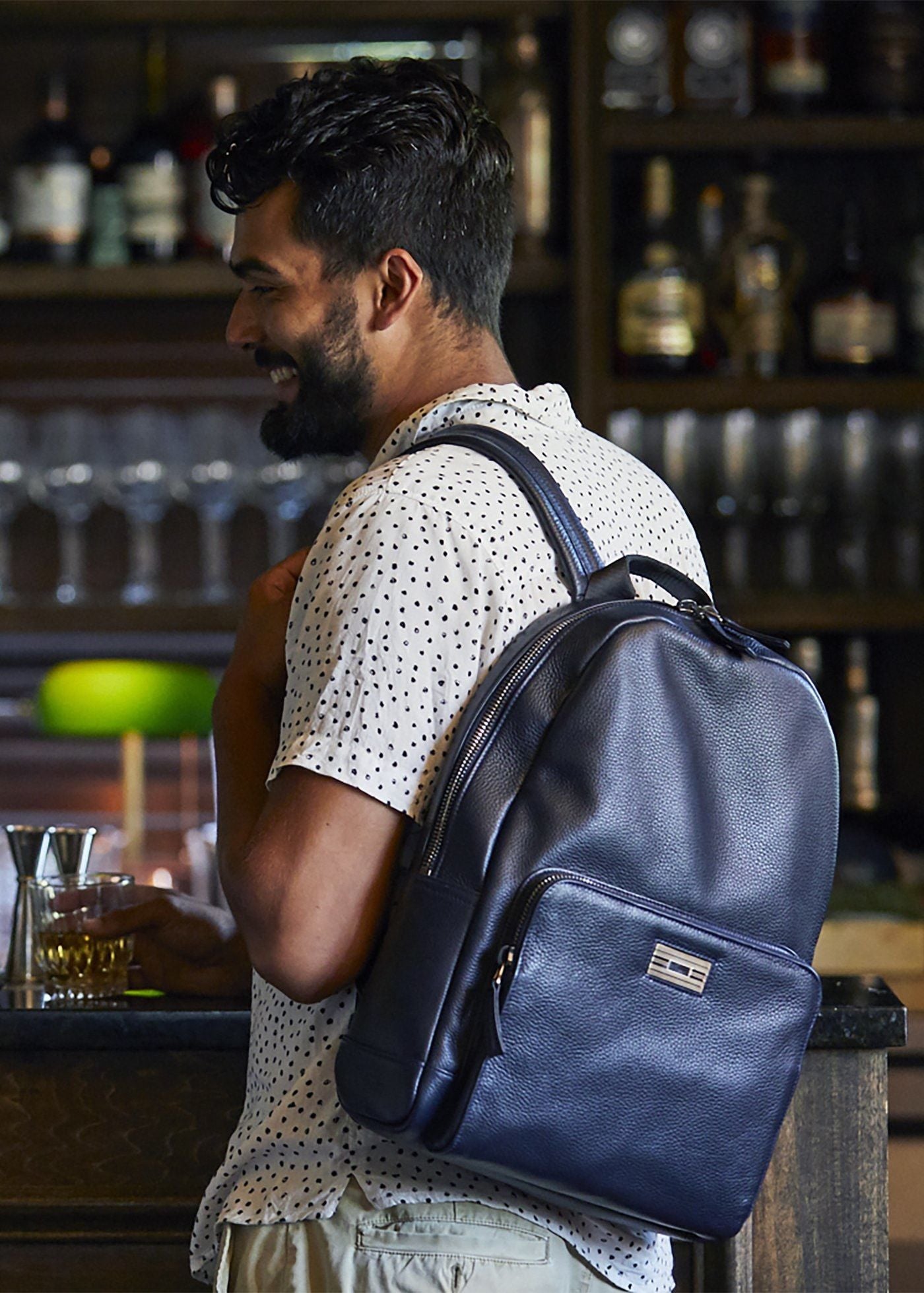 Navy Pebble Leather Stuart Backpack on Model - Darby Scott