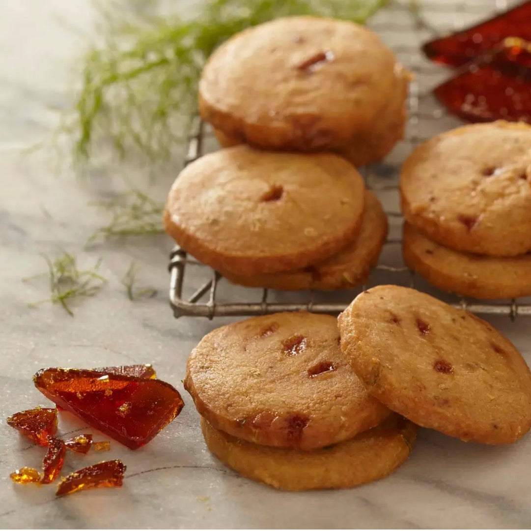 Burnt sugar & fennel shortbread  on cookie rack with jam