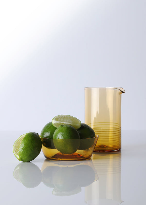 Hand blown citrine mixing glass and bowl with limes