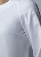 Close up of front of White Long Sleeve Jewel Neck Blouse - Darby Scott