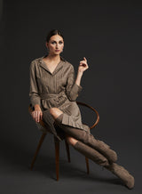 Seated model in Taupe Cool Wool Pin Tuck Shirt Dress - Darby Scott