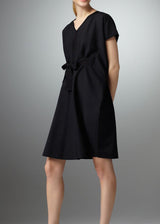Model in Black Silk knee length caftan style pull-over dress - Darby Scott